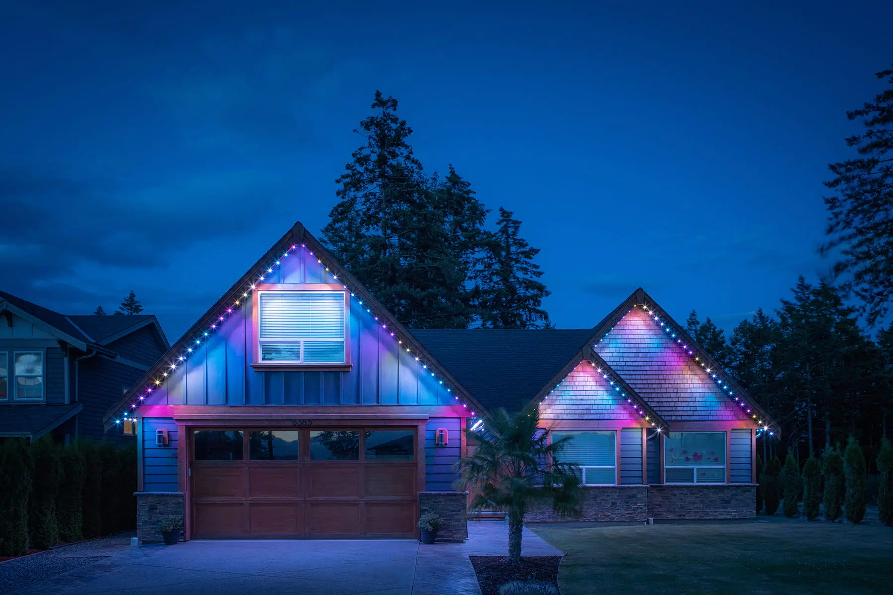 Permanent light installation Calgary — RGBWW soffit lighting app-controlled from smartphone